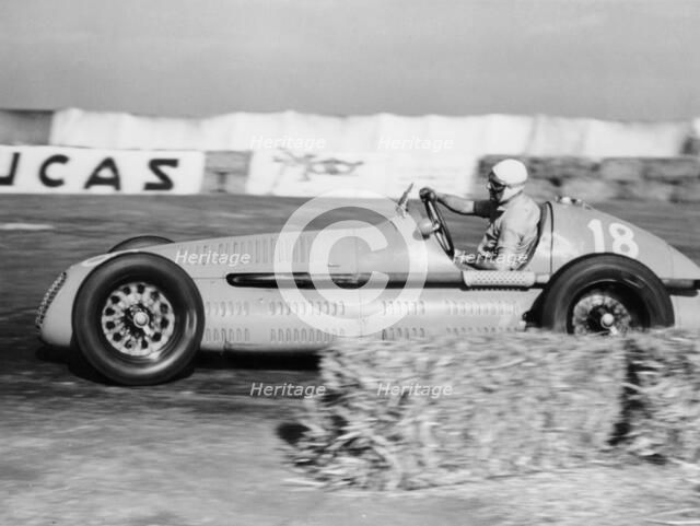 Luigi Villoresi winning the British Grand Prix, Silverstone, October 1948. Artist: Unknown