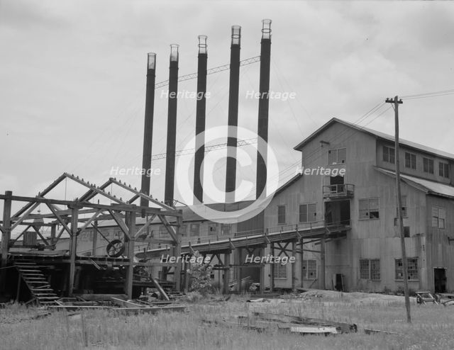Lumber mill being dismantled at Careyville, Florida, 1937. Creator: Dorothea Lange.