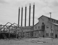 Lumber mill being dismantled at Careyville, Florida, 1937. Creator: Dorothea Lange