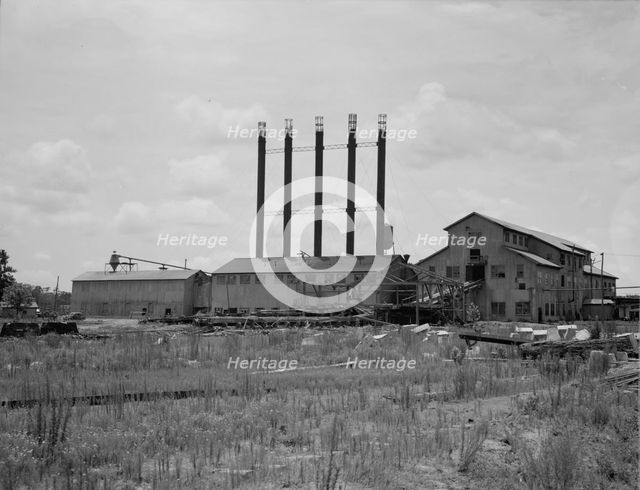 Lumber mill being dismantled, Careyville, Florida, 1937. Creator: Dorothea Lange.