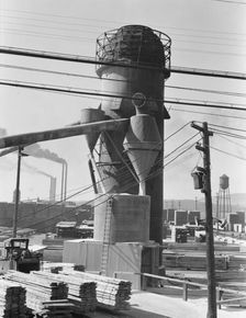 Lumber burner and stacks of the Big Lakes Lumber Company..., Klamath Falls, Oregon, 1939. Creator: Dorothea Lange