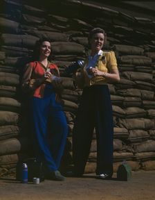 Lunchtime brings a few minutes of rest...Douglas Aircraft Company's plant, Long Beach, Calif. , 1942 Creator: Alfred T Palmer