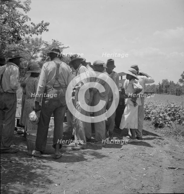 Lunchtime for cotton hoers, Mississippi Delta, 1937. Creator: Dorothea Lange.