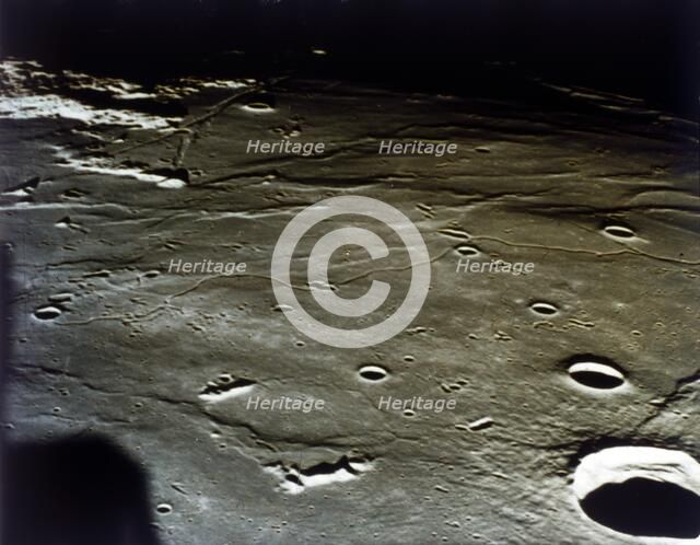 Lunar Module approaching landing site on the Moon, Apollo II mission, July 1969. Creator: NASA.