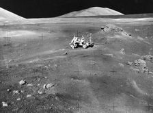 Lunarscape of Station 4, showing Harrison Schmitt at the lunar roving vehicle, 1972. Creator: Unknown