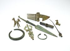 Luristan small bird pendant and assorted tools