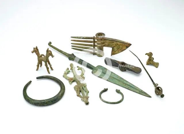 Luristan small bird pendant and assorted tools. Artist: Unknown.