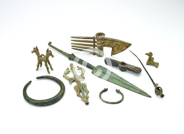 Luristan small bird pendant and assorted tools. Artist: Unknown.