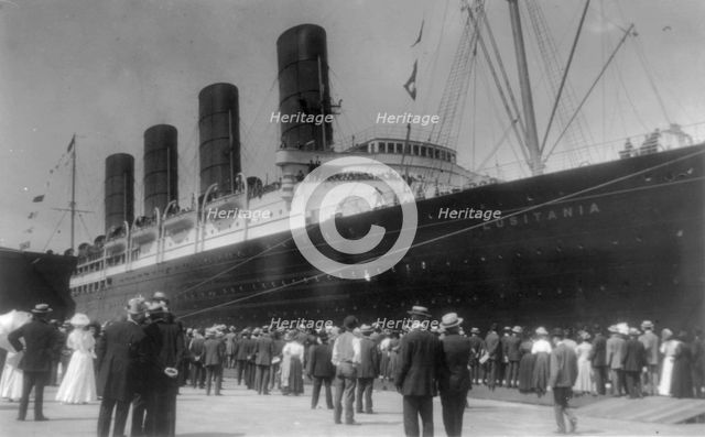 LUSITANIA arriving in N.Y. for first time, Sept. 13, 1907: starboard view; crowd at dock..., 1907. Creator: Frances Benjamin Johnston.