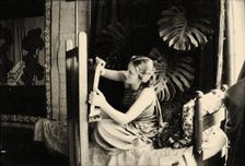 Lydia Delectorskaya preparing a canvas in Matisse’s studio, Place Charles-Félix, Nice, 1936. Creator: Matisse, Henri (1869-1954)