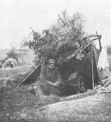 'M. Vladimir Betzitch, peintre militaire serbe, sous sa tente, au debut de la campagne. 1916. Creator: Unknown