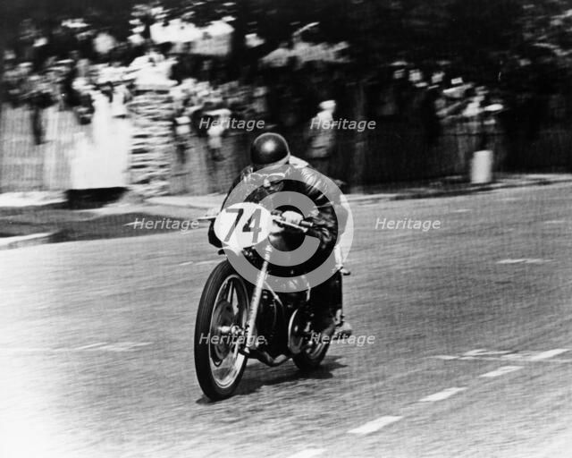M Barrington on a Moto Guzzi bike, Isle of Man TT, 1949. Artist: Unknown