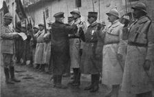 M. Poincare a Verdun; decoration du commandant Nicolai, chef du bataillon qui est rentre le..., 191 Creator: Unknown