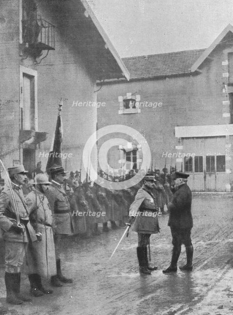 'M. Poincare a Verdun; le general Mangin, salue de l'epee le President de la Republique qui..., 1916 Creator: Unknown.