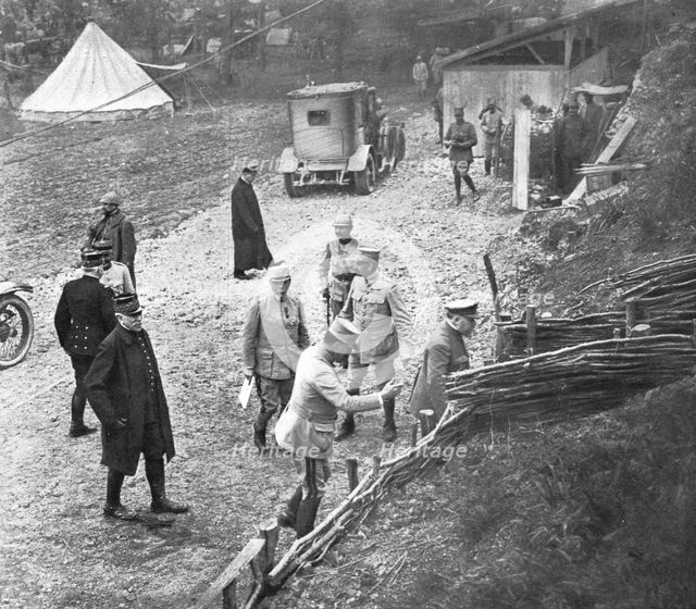 'M. Poincare, le Ministre de la Guerre et le general Joffre sur le front de la Somme; au..., 1916. Creator: Unknown.