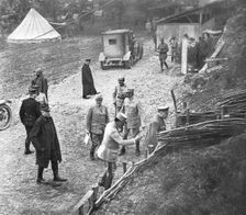 M. Poincare, le Ministre de la Guerre et le general Joffre sur le front de la Somme; au..., 1916. Creator: Unknown