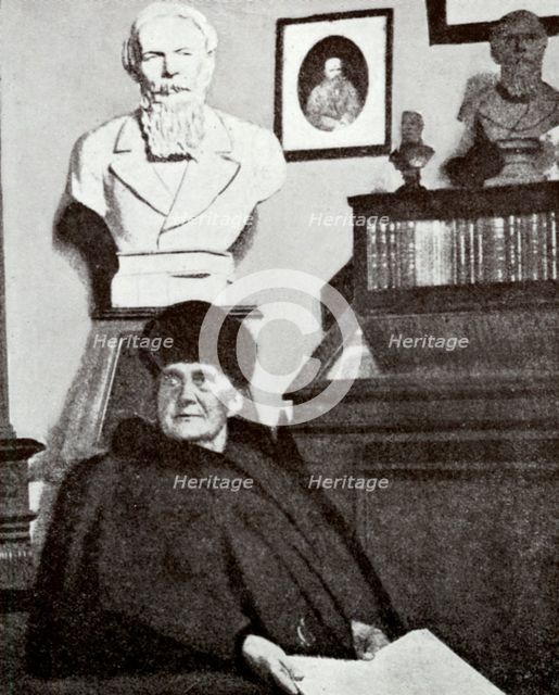 Mme Dostoevsky at work in the Dostoevsky room of the Moscow Historical Museum, 1916. Creator: Unknown.
