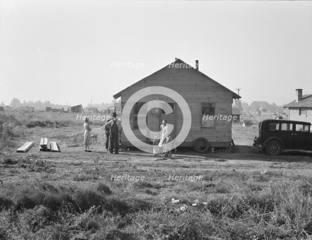 Mother and two children, husband, his brother and brother's..., near Klamath Falls, Oregon, 1939. Creator: Dorothea Lange.