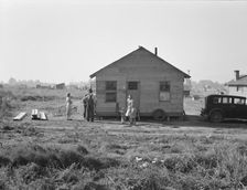 Mother and two children, husband, his brother and brother's..., near Klamath Falls, Oregon, 1939. Creator: Dorothea Lange