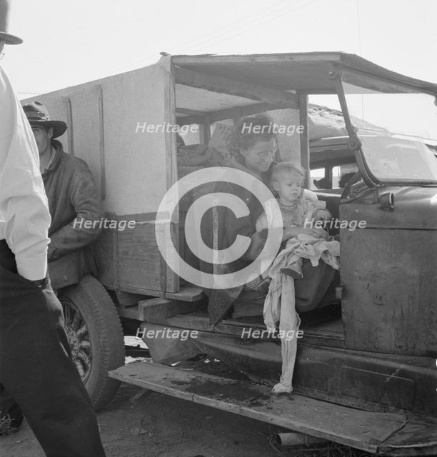 Mother and baby of family on the road, Tulelake, Siskiyou County, California, 1939. Creator: Dorothea Lange.