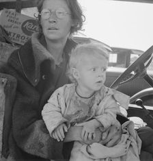 Mother and baby of family on the road, Tulelake, Siskiyou County, California, 1939. Creator: Dorothea Lange