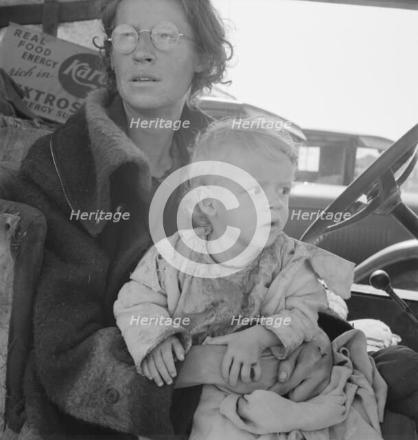 Mother and baby of family on the road, Tulelake, Siskiyou County, California, 1939. Creator: Dorothea Lange.