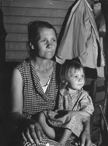 Mother and child, FSA camp, Farmersville, Tulare County, California, 1939. Creator: Dorothea Lange