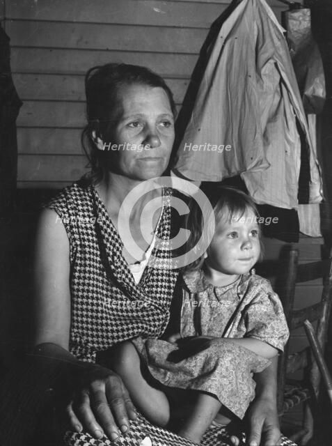 Mother and child, FSA camp, Farmersville, Tulare County, California, 1939. Creator: Dorothea Lange.