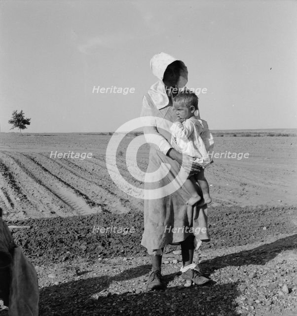 Mother and child of flood refugee family, near Memphis, Texas, 1937. Creator: Dorothea Lange.