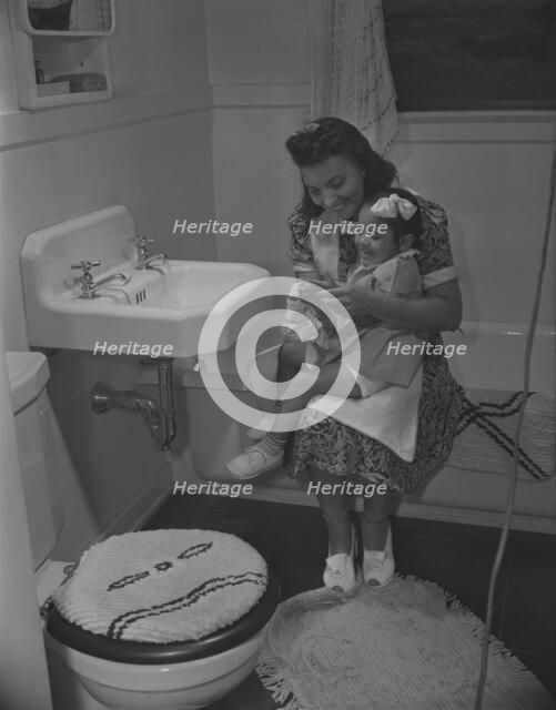 Mother and her daughter, Frederick Douglass housing project, Anacostia, D.C., 1942. Creator: Gordon Parks.