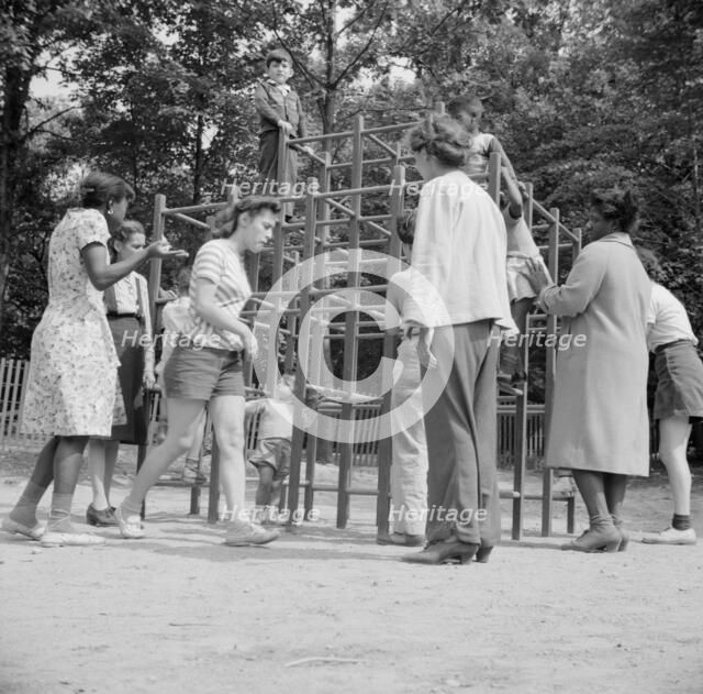 Mothers supervising their children at Camp Ellen Marvin, Arden, New York, 1943. Creator: Gordon Parks.
