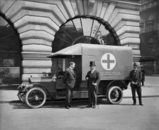 Motor ambulance on the Strand, Westminster, London, May 1915. Artist: H Bedford Lemere