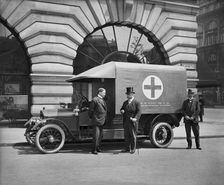 Motor ambulance on the Strand, Westminster, London, May 1915. Artist: H Bedford Lemere