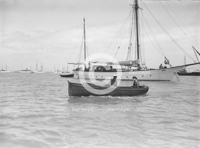 Motor boat 'Hubble-Bubble' and mariners, 1911. Creator: Kirk & Sons of Cowes.