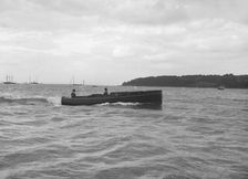 Motor launch Nitsu under way, 1912. Creator: Kirk & Sons of Cowes