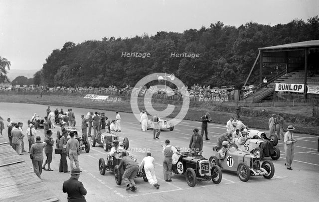 Motor race at Donington Park, Leicestershire, 1936. Artist: Bill Brunell.