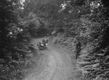 Motorcycle and sidecar, B&HMC Brighton-Beer Trial, Simms Hill, Ilsington, Devon, 1930. Artist: Bill Brunell