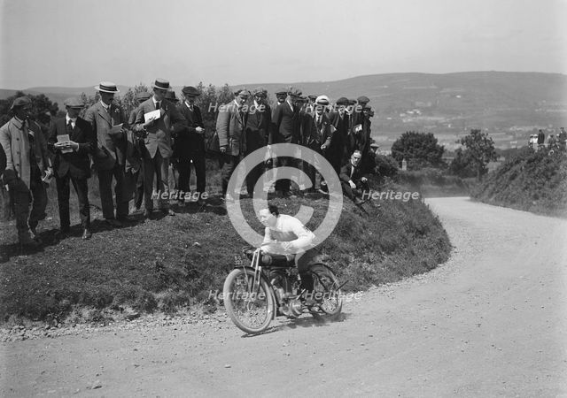 Motorcycle competing in the South Wales Auto Club Caerphilly Hillclimb, Wales, pre 1915.   Artist: Bill Brunell.