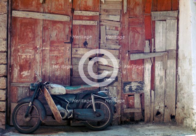 Motorcycle in the street in Khania. Artist: Unknown
