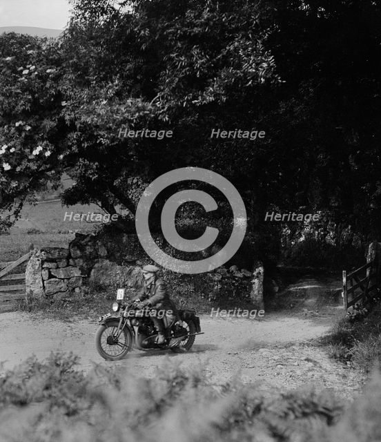 Motorcycle of WT Taylor, Brighton and Hove Motor Club Brighton-Beer Trial, 1930. Artist: Bill Brunell.