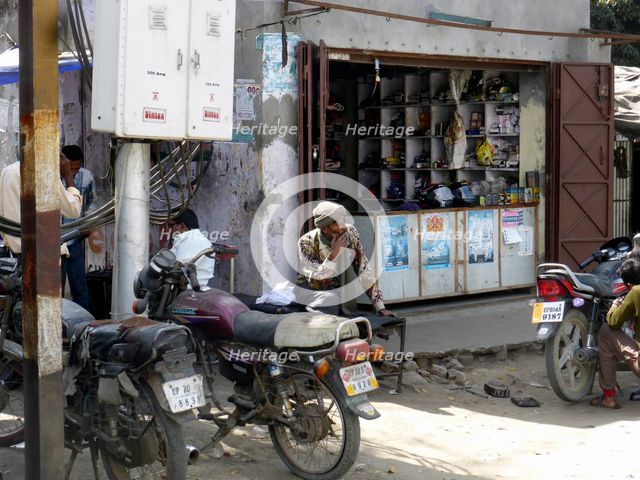 Motorcycle repair shop, Uttarakhand, India. Creator: Unknown.
