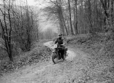 Motorcycle ridden by RD Quincy competing in the Inter-Varsity Trial, November 1931. Artist: Bill Brunell