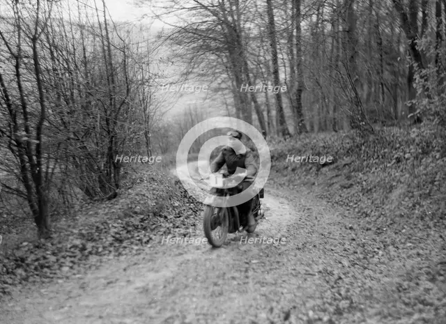 Motorcycle ridden by RD Quincy competing in the Inter-Varsity Trial, November 1931. Artist: Bill Brunell.