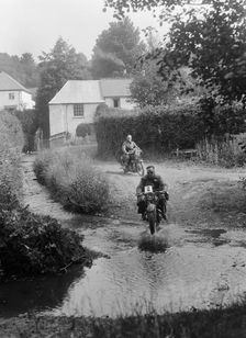 Motorcycles competing in the B&HMC Brighton-Beer Trial, Windout Lane, near Dunsford, Devon, 1934. Artist: Bill Brunell