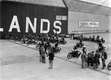 Motorcycles on the start line at the MCC Members Meeting, Brooklands, 10 September 1938. Artist: Bill Brunell