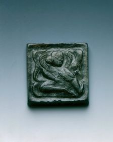 Mottled black jade square belt plaque with drummer in relief, Tang dynasty, China, 618-907