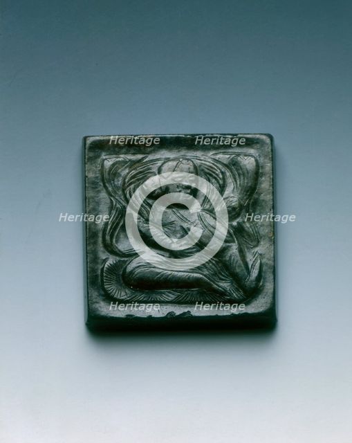 Mottled black jade square belt plaque with drummer in relief, Tang dynasty, China, 618-907. Artist: Unknown