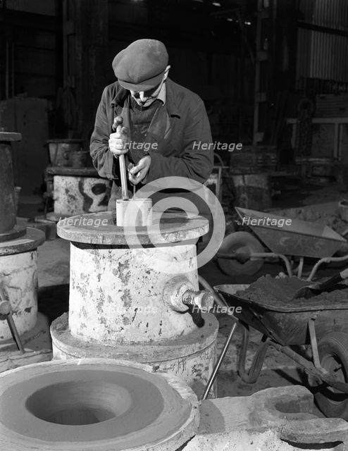 Moulding in the Wombwell Foundry, South Yorkshire, 1963.  Creator: Michael Walters.