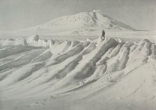 Mount Erebus Over a Water-Worn Iceberg October 1911, (1913). Artist: Herbert Ponting