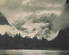 Mountain mists, Lake Ada, Milford Sound, 1920s. Creator: Harry Moult